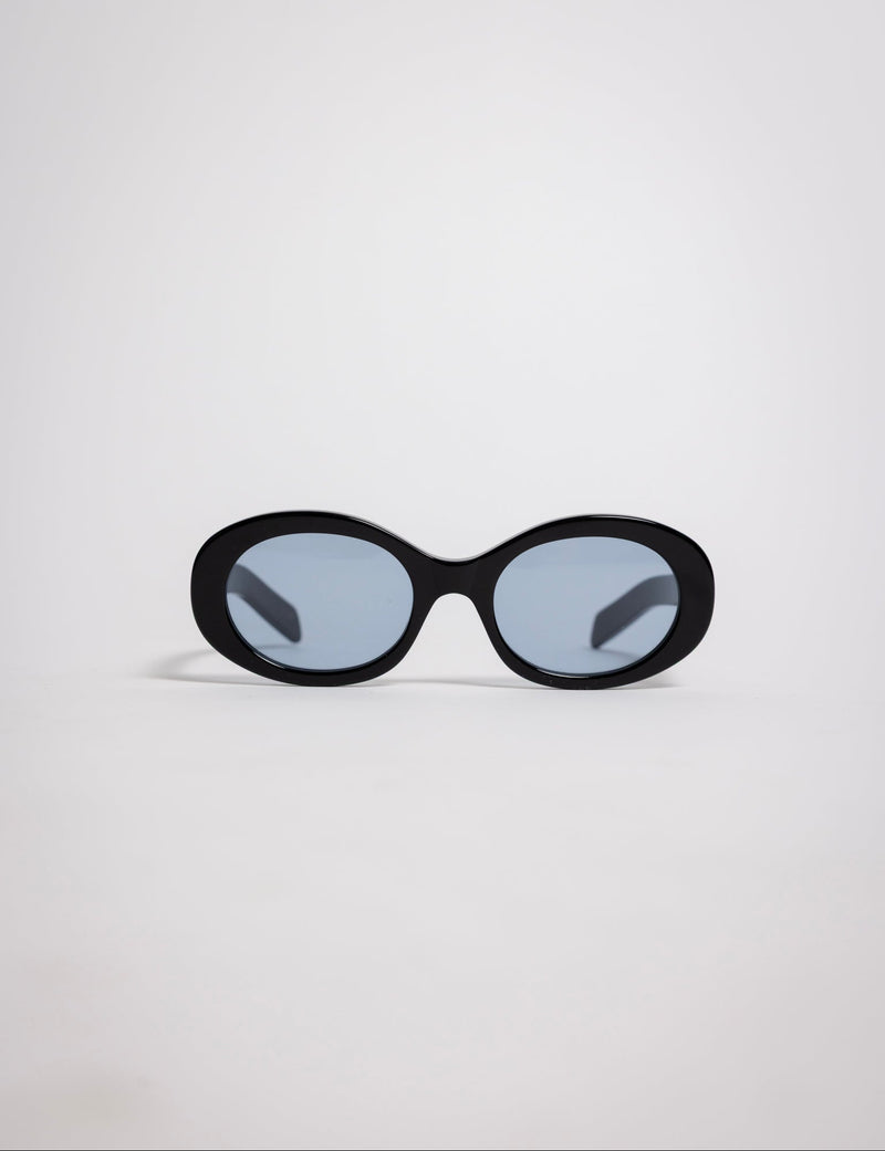 141 Waverly Pl, Side Eye oval sunglasses, black acetate frame with blue tinted lenses, sideeye [variant:Black / Blue]