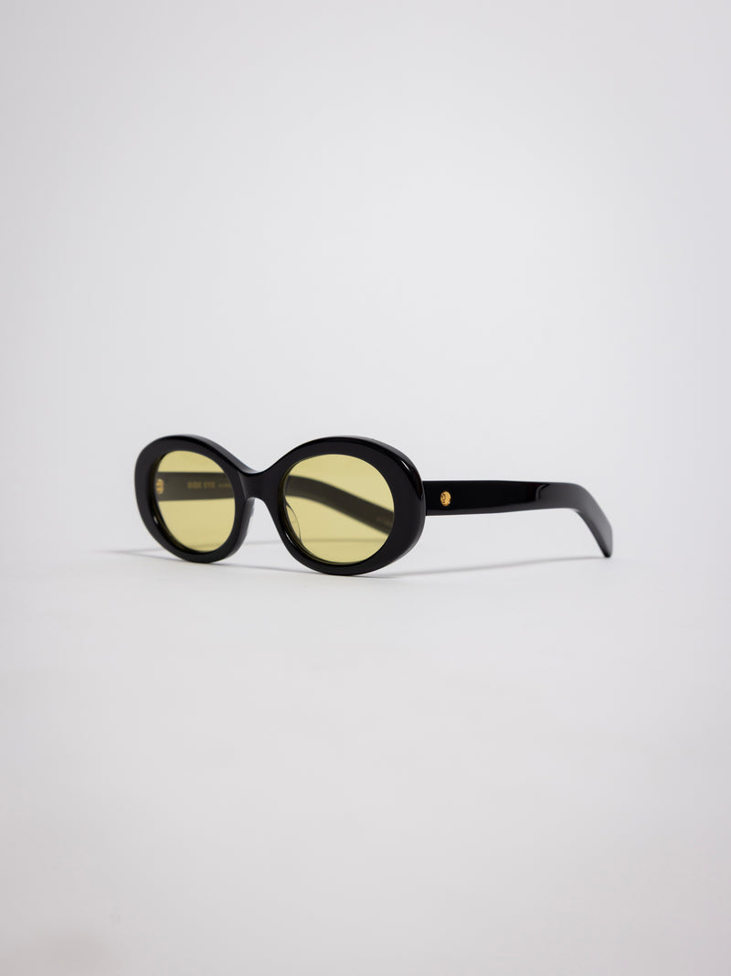 141 Waverly Pl, Side Eye oval sunglasses, black acetate frame with yellow tinted lenses, sideeye [variant:Black / Yellow]
